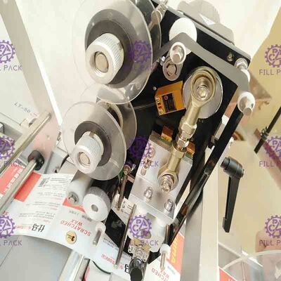 Étiqueteur semi automatique adhésif de bouteille de machine à étiquettes de bouteille ronde