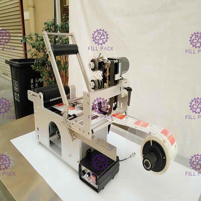 Étiqueteur semi automatique adhésif de bouteille de machine à étiquettes de bouteille ronde