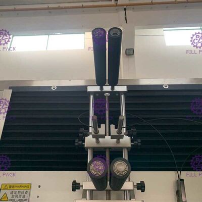 Machine à étiquettes de bouteille de jus