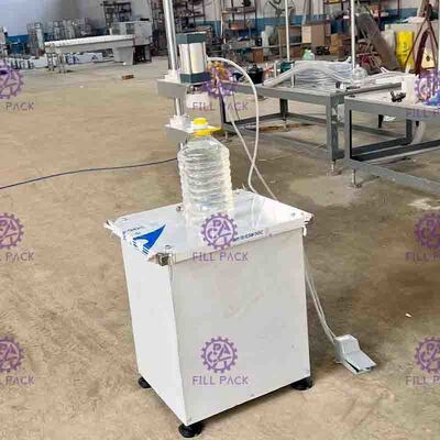 Machine à emballer pneumatique semi automatique de bouteille pour des barils pressant des chapeaux